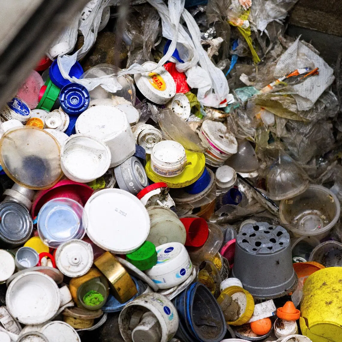 FILE PHOTO: Plastic trash is sorted at the waste sorting plant of recycling company Remondis in Erftstadt, Germany, August 12, 2025. REUTERS/Jana Rodenbusch/File Photo