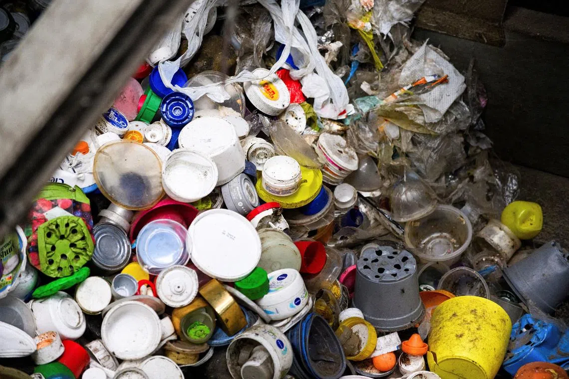 FILE PHOTO: Plastic trash is sorted at the waste sorting plant of recycling company Remondis in Erftstadt, Germany, August 12, 2025. REUTERS/Jana Rodenbusch/File Photo